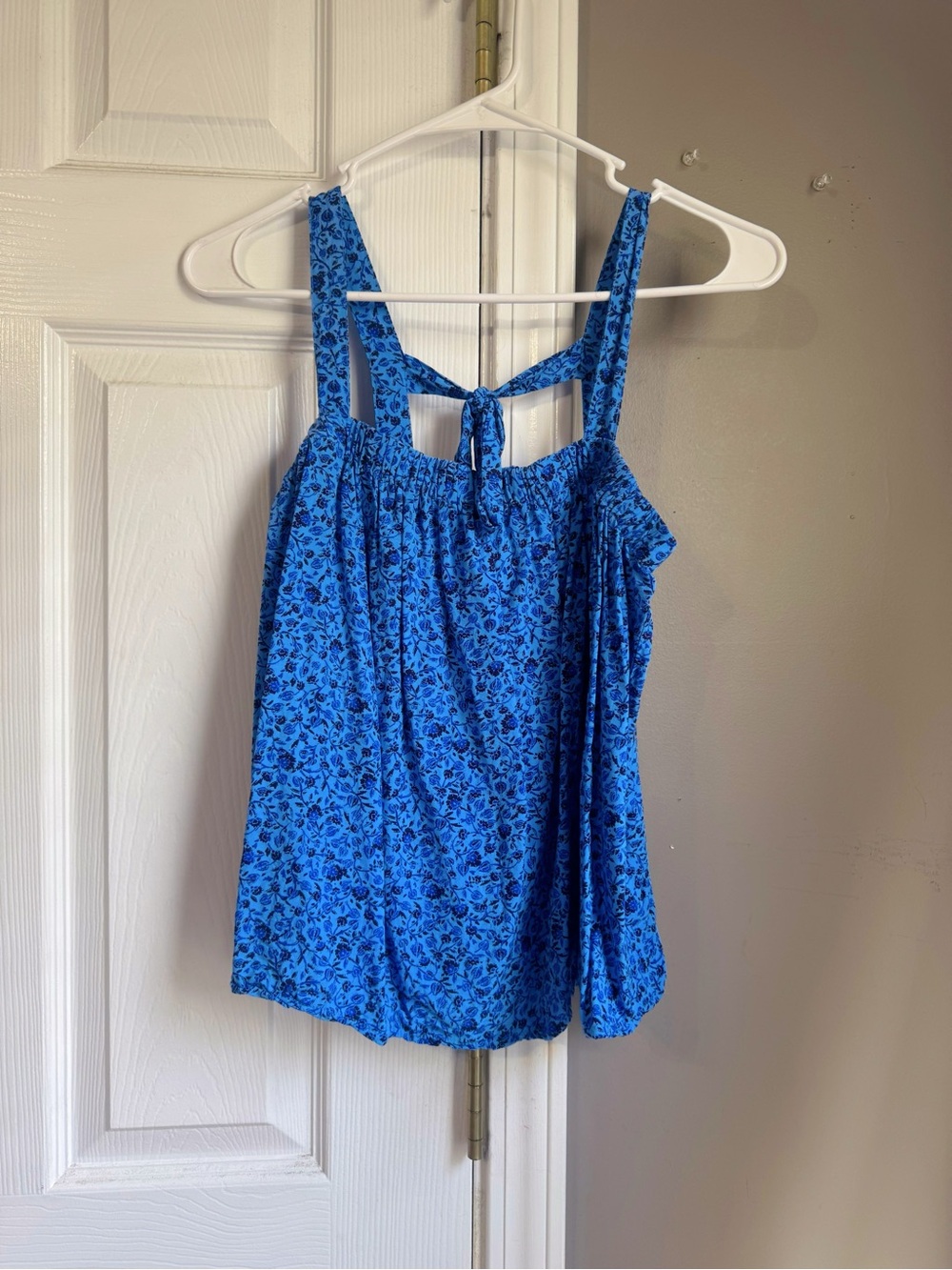 Blue floral top with open back